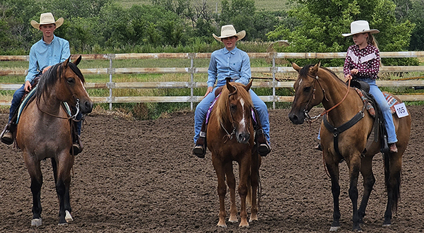 Fair participants on horseback at the county fair